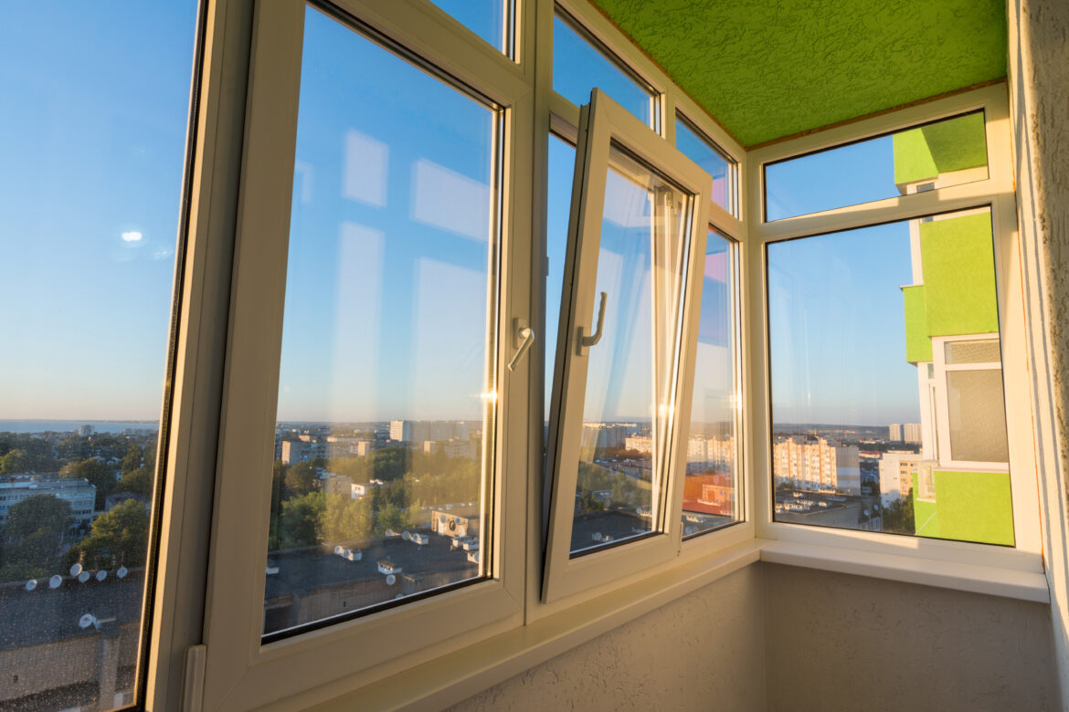 Glazing of a balcony in an apartment of a multi-storey residential building