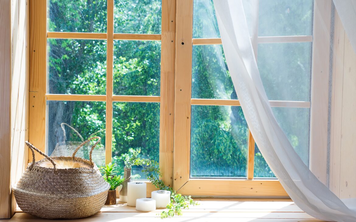 Empty room, wooden window with with curtain and window